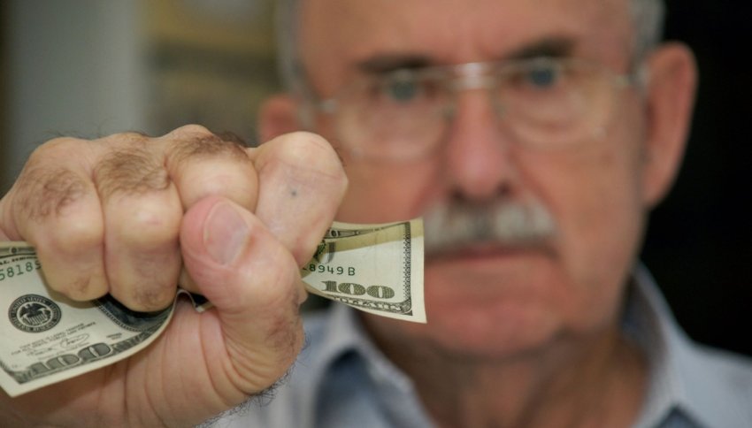 elderly handling money
