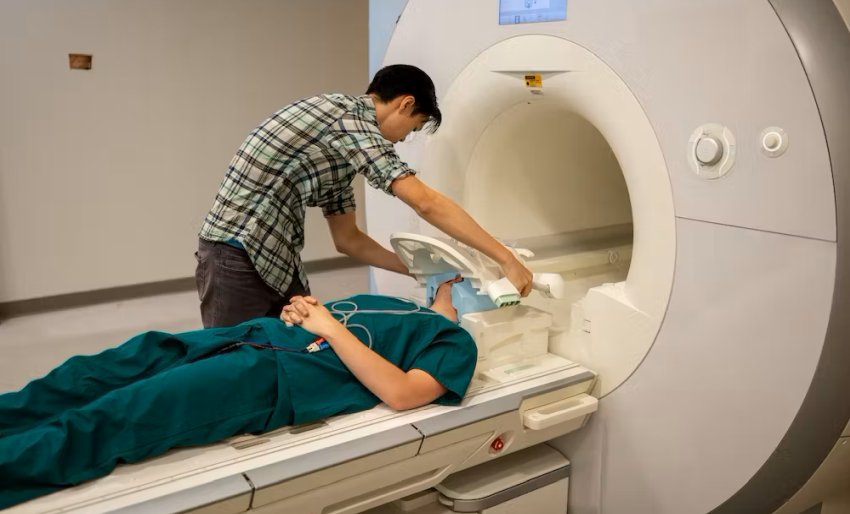 Scanning patient brain UT Biomedical Imaging Center