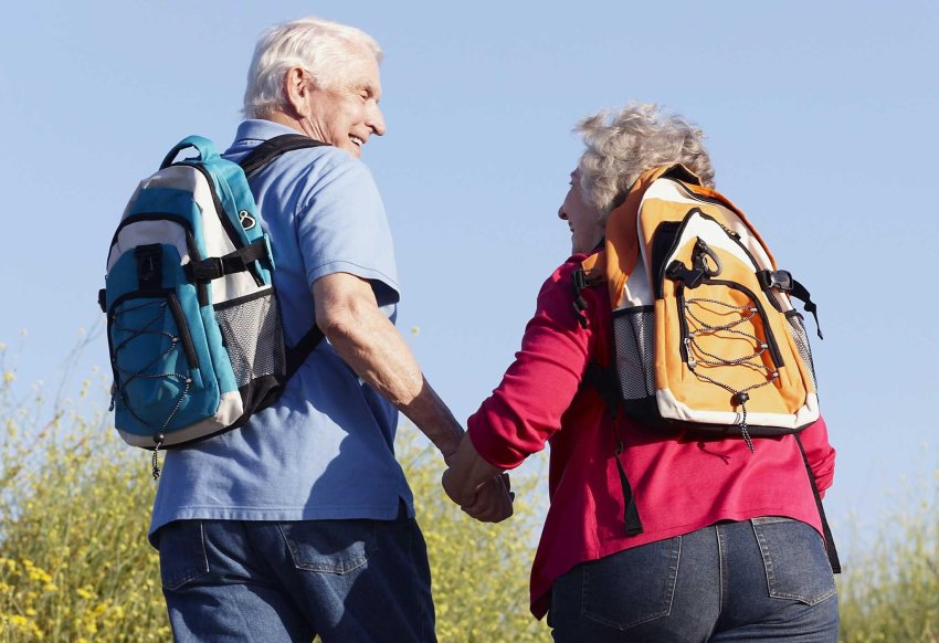 elderly couple hiking