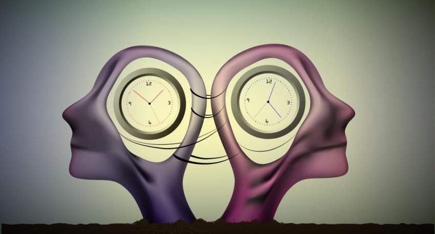 two heads containing clocks